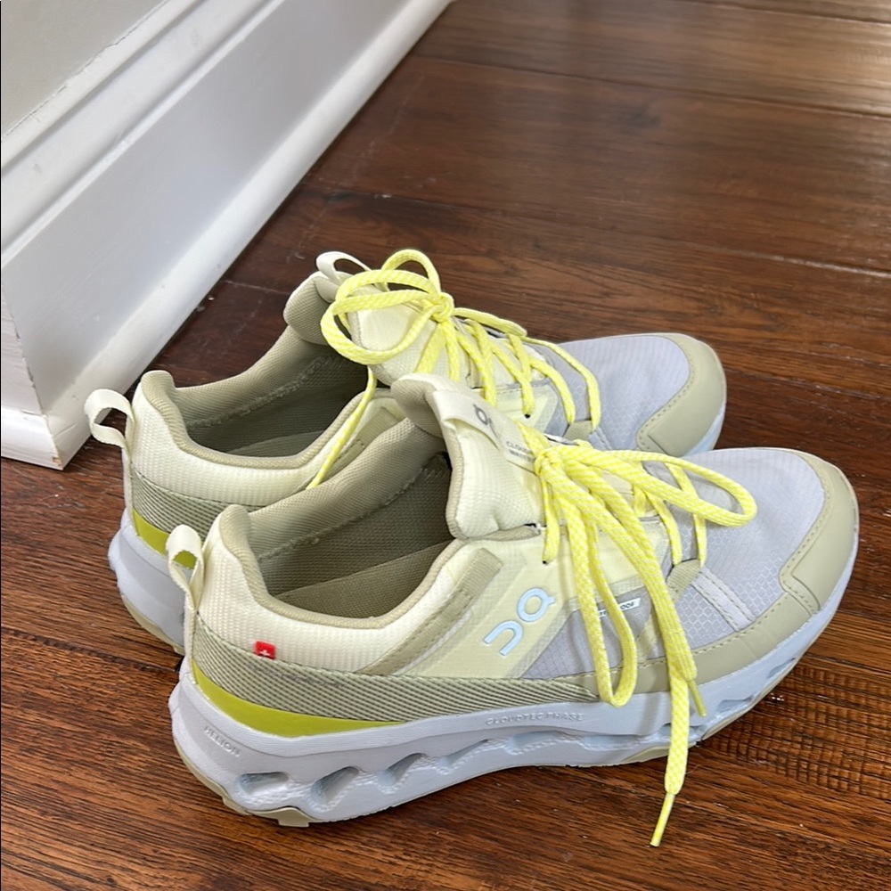 On Running Women's Sneakers in Pale Yellow and Light Gray with Neon Yellow Laces